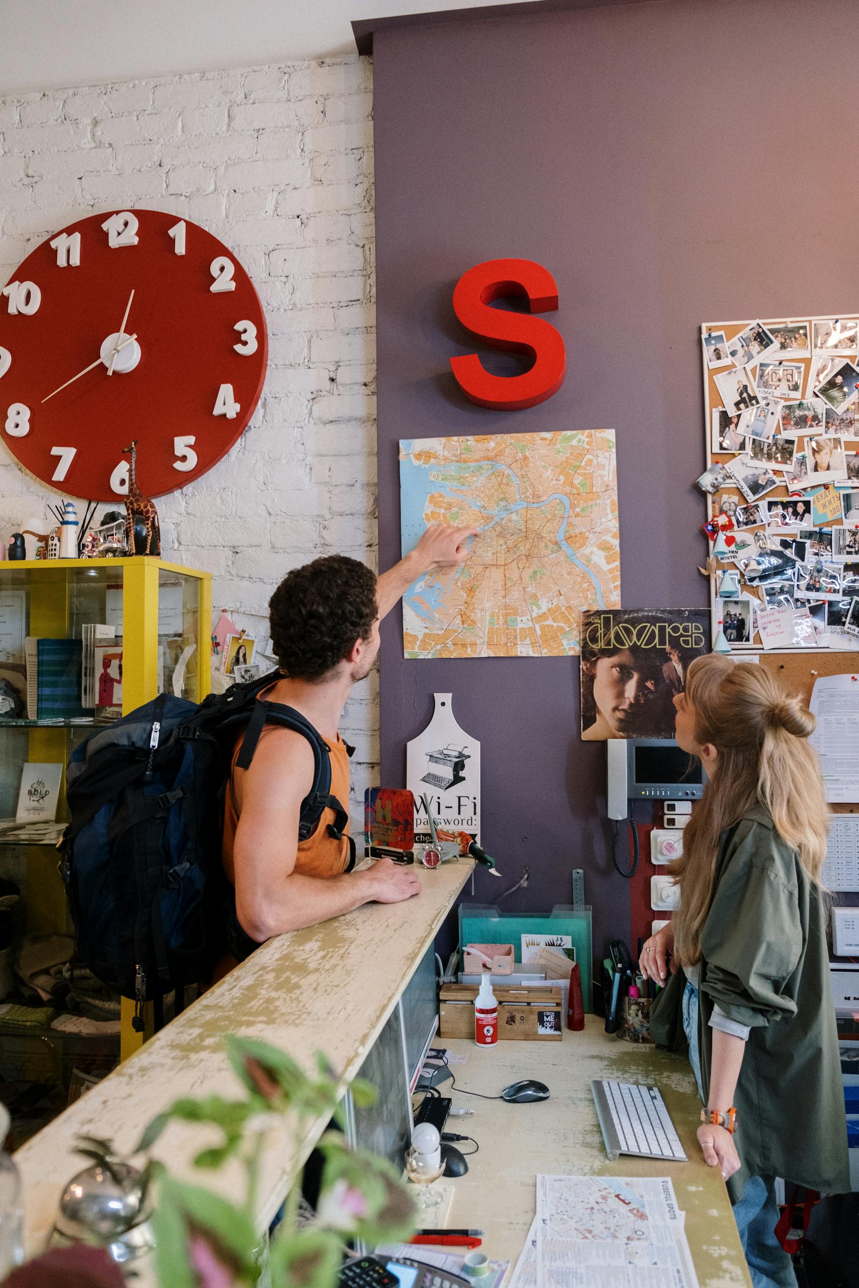 Tourist Pointing on Map