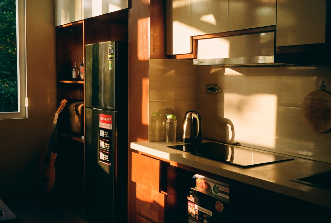The Image Of The 10 Best Kitchen Lighting Ideas For 2025 Sunlight Pours Into The Kitchen Through Big Windows