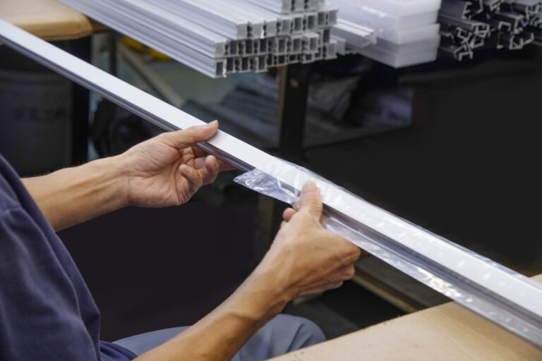Black Anodized LED Profiles 4 Assembling a linear LED profile before it goes to ageing and packing